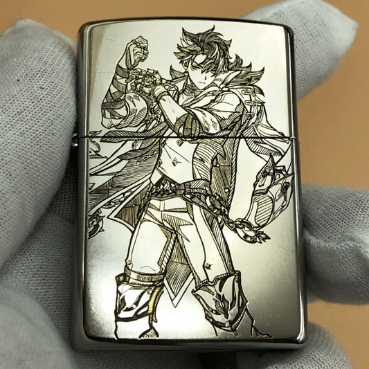 Front view of a Zippo lighter engraved with Childe (Tartaglia) from Genshin Impact in a dynamic action pose.